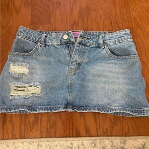 Edikted blue denim mini skirt with frayed hem and pockets
